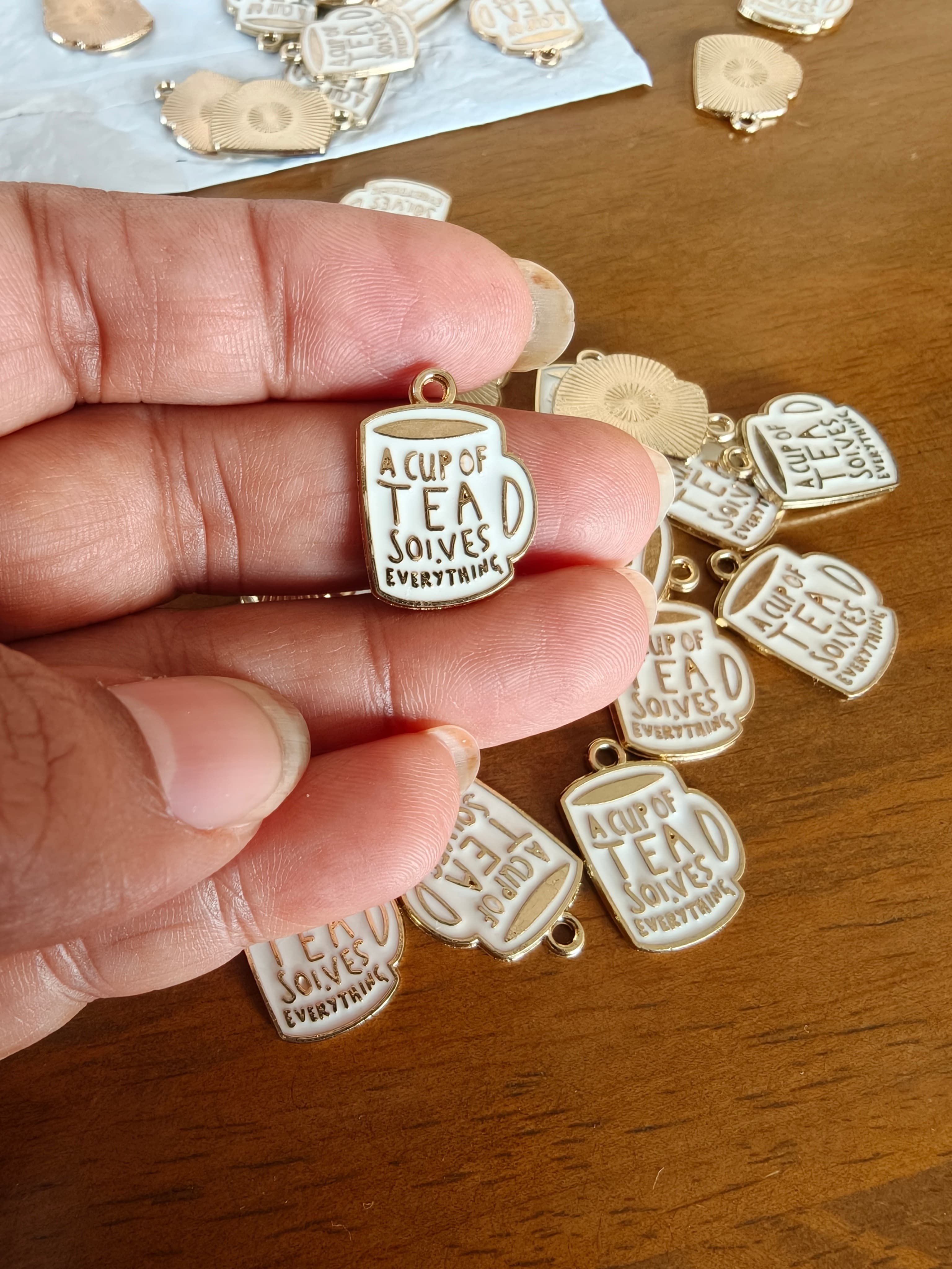 Tea charm