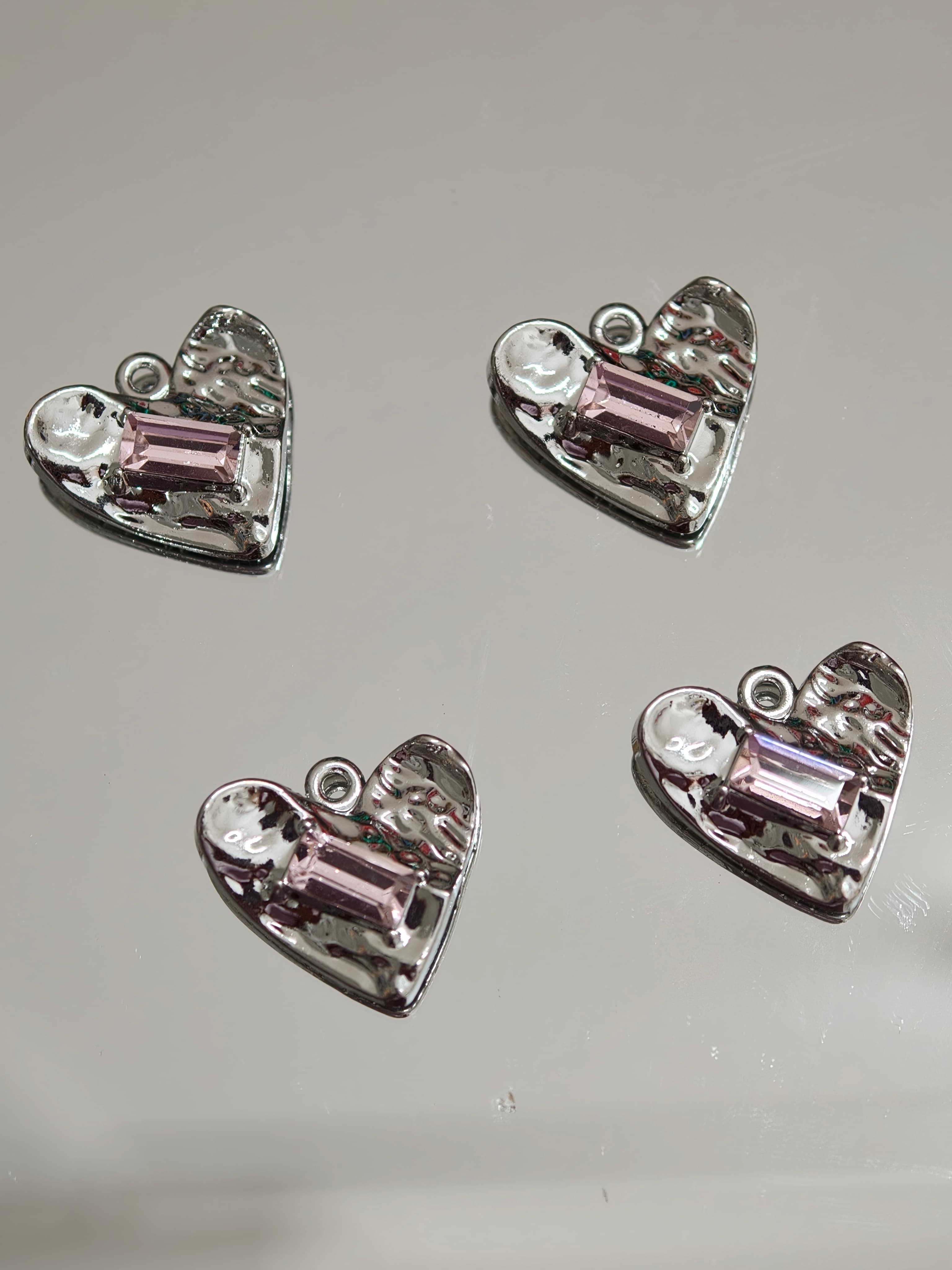 Heart charm with pink stone